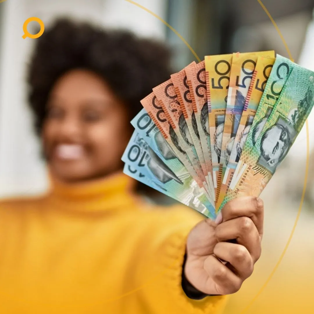 A woman holding a money