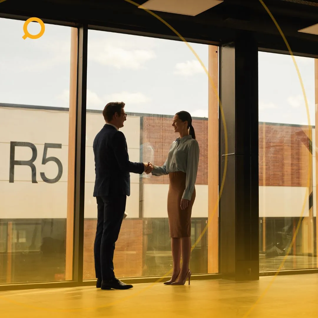 An image showing the buyers' agent, and property investor shaking hands