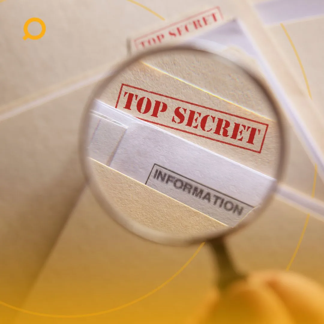 Image showing a top secret phrase enlarged using a magnifying glass