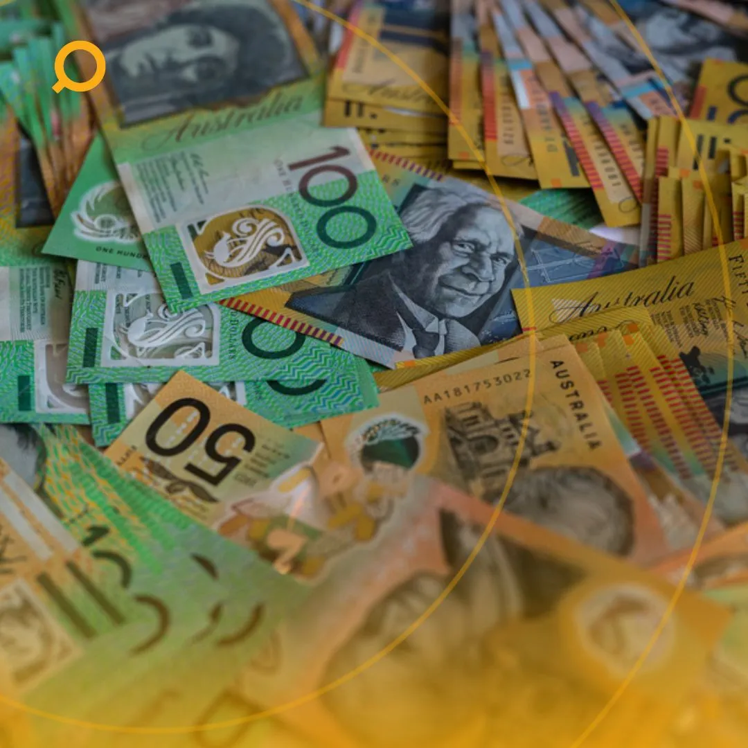 A close-up of piled Australian Dollars