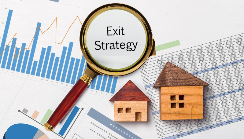 A magnifying glass highlighting the words 'Exit Strategy' over financial charts