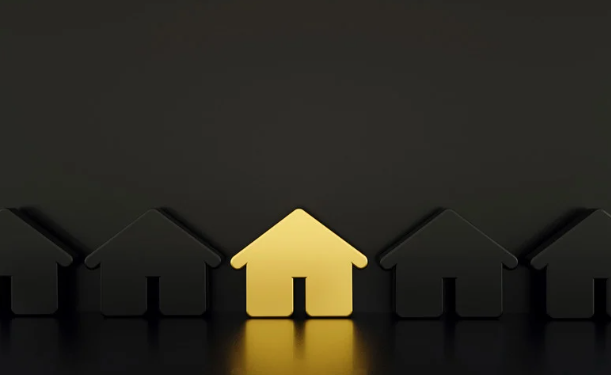  A row of black house icons with one glowing yellow house standing out in the center against a dark background.
