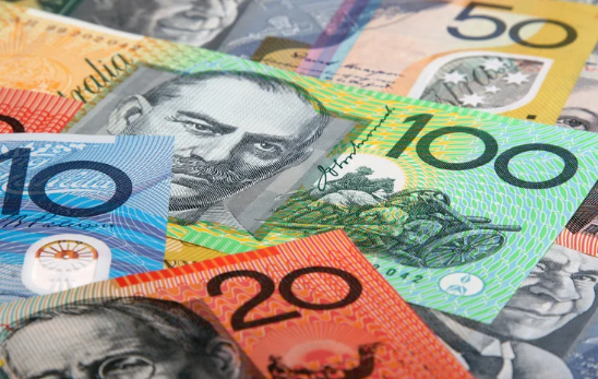 Australian currency notes symbolising mortgage repayments, property investment, and real estate market finance.