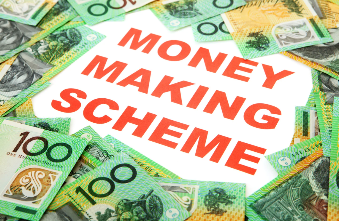 The words “Money Making Scheme” surrounded by Australian hundred-dollar bills, symbolising smart income strategies and wealth-building opportunities.