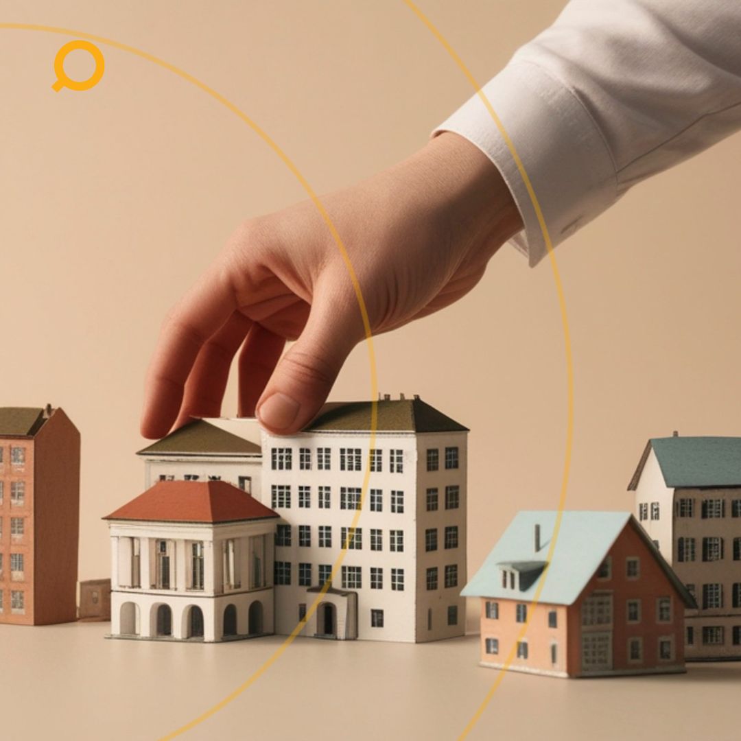 Preview image that shows the blog title placed on a photo, showing a hand picking a miniature investment property