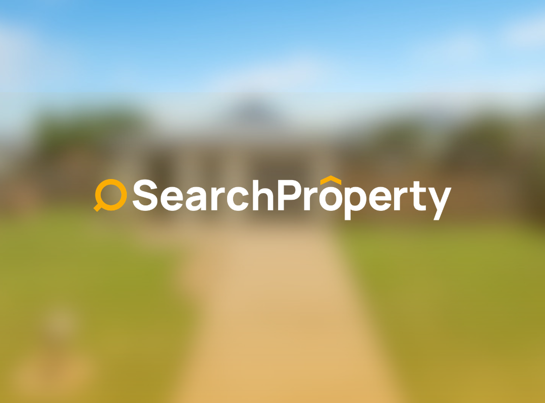 Modern single-storey home in Queensland with a wide driveway, neat lawn, and mountain views in the background.