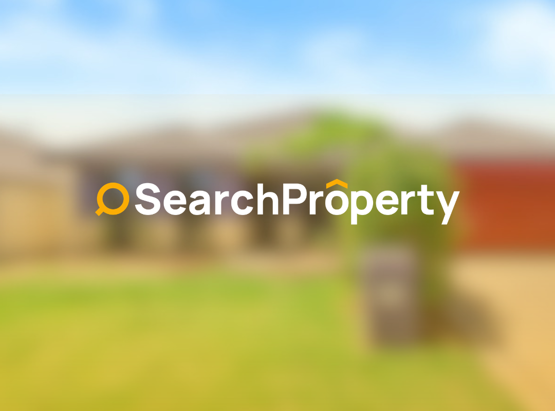 Low-maintenance investment property featuring a modern single-level home, double garage, and spacious front yard.