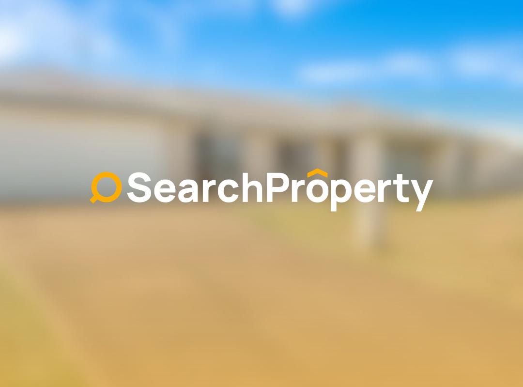 Single-storey investment home with double garage, driveway, and front yard.