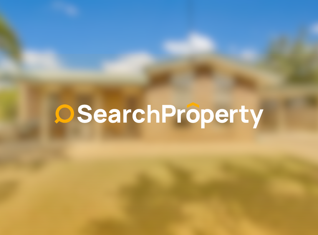 Modern single-storey investment home with a double garage, landscaped front yard and wide driveway under a clear blue sky
