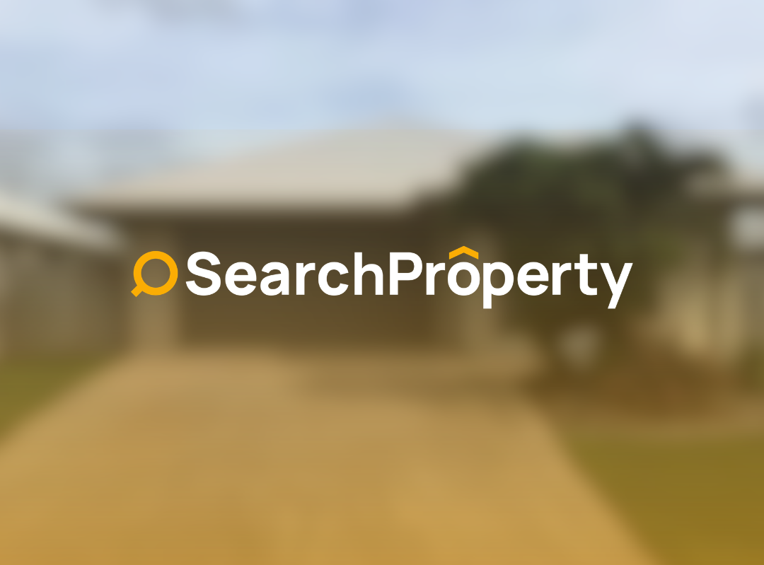 Modern single-storey investment home with a double garage, spacious driveway and landscaped front yard beneath a clear blue sky.