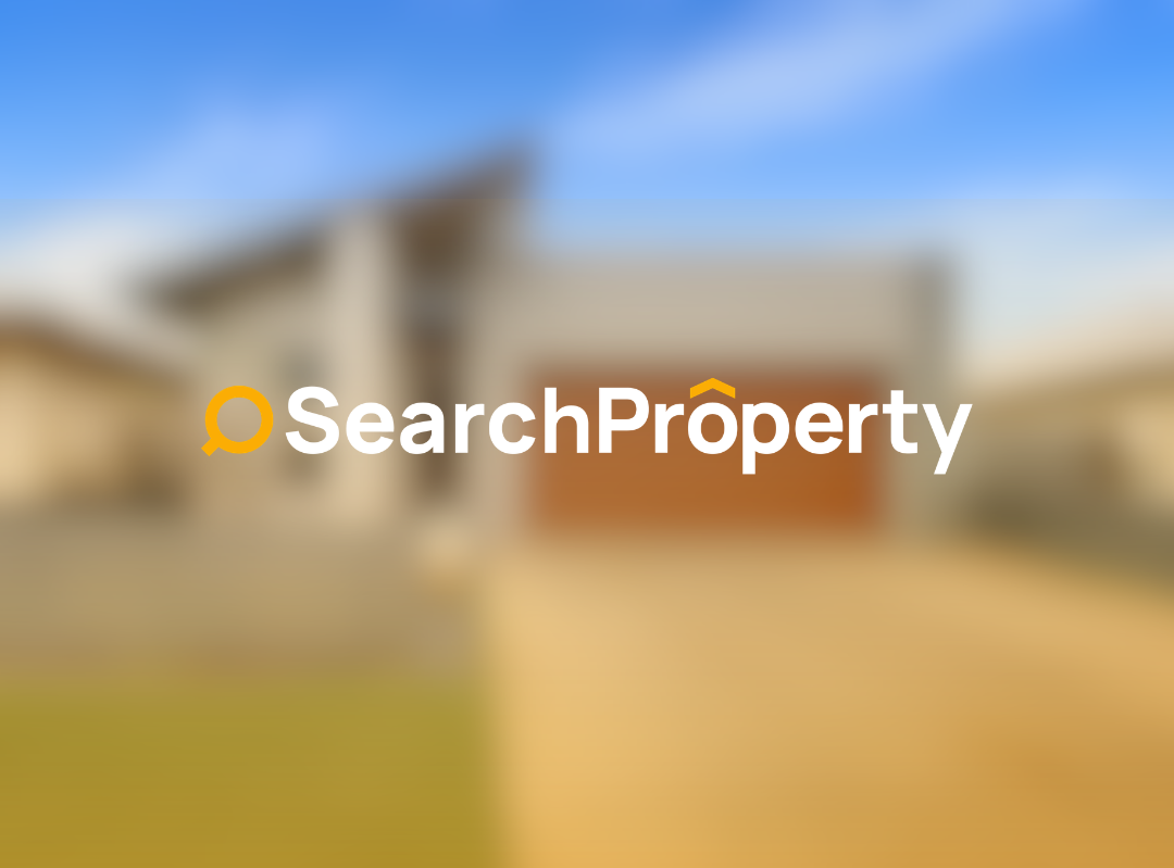 Modern two-storey home with a double garage, driveway, and landscaped front yard under a clear blue sky.