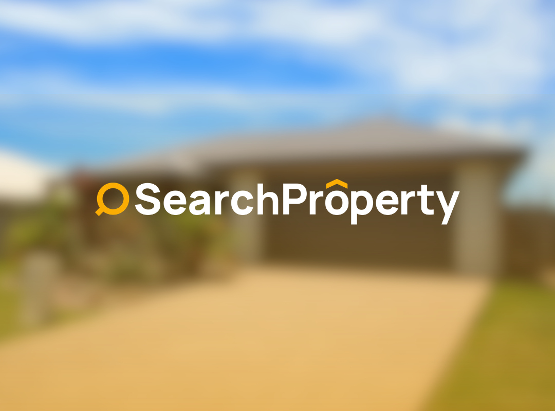 Front exterior of a single-storey Queensland investment property with a driveway and landscaped garden.